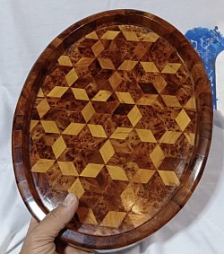Plateau rond en racine de tuya avec marqueterie CHF 79.00